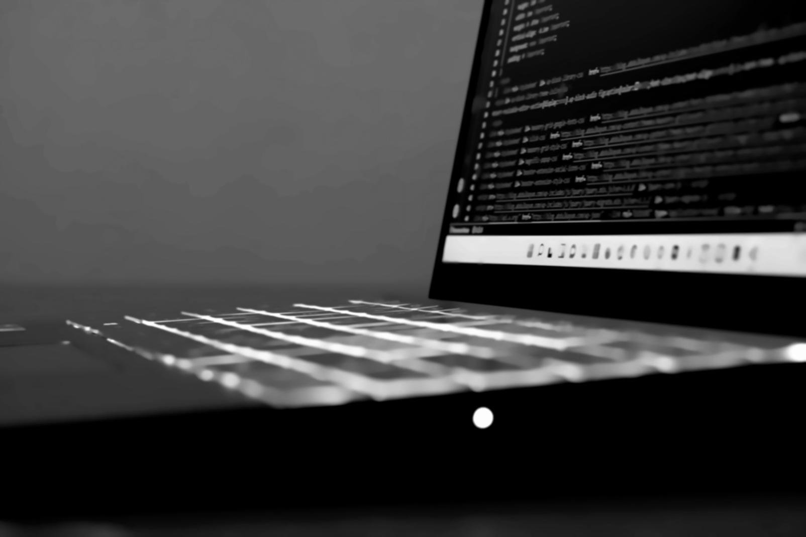 IT professionals collaborating on performance testing projects in modern workspace